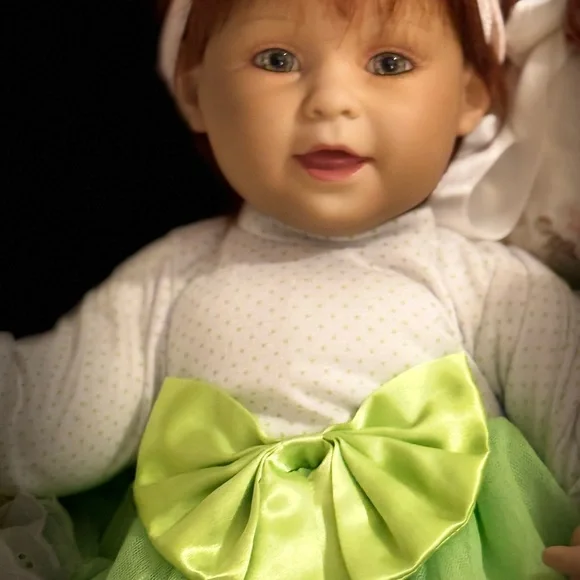 Adorable Baby Doll with Pink Bow - Picture 3 of 9